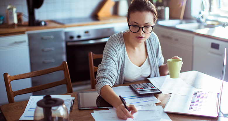 Woman paying bills