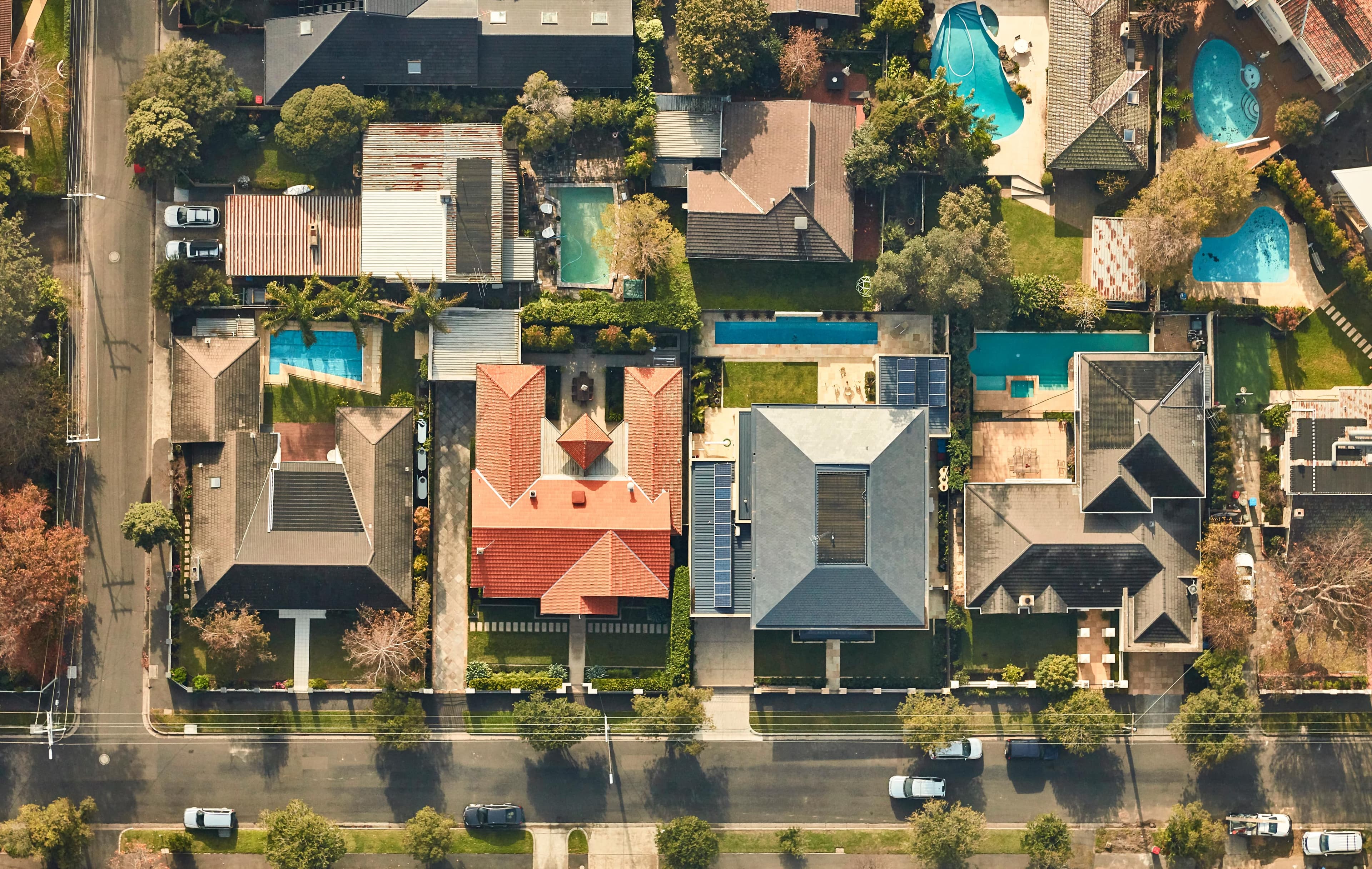 Aerial view of suburban neighborhood with houses and streets